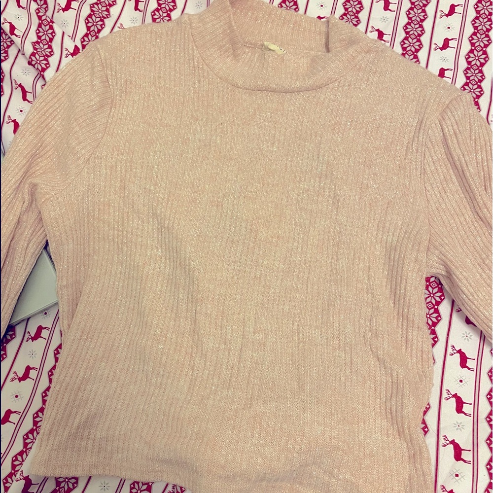 Pink sparkly turtle neck ties on the back shirt
